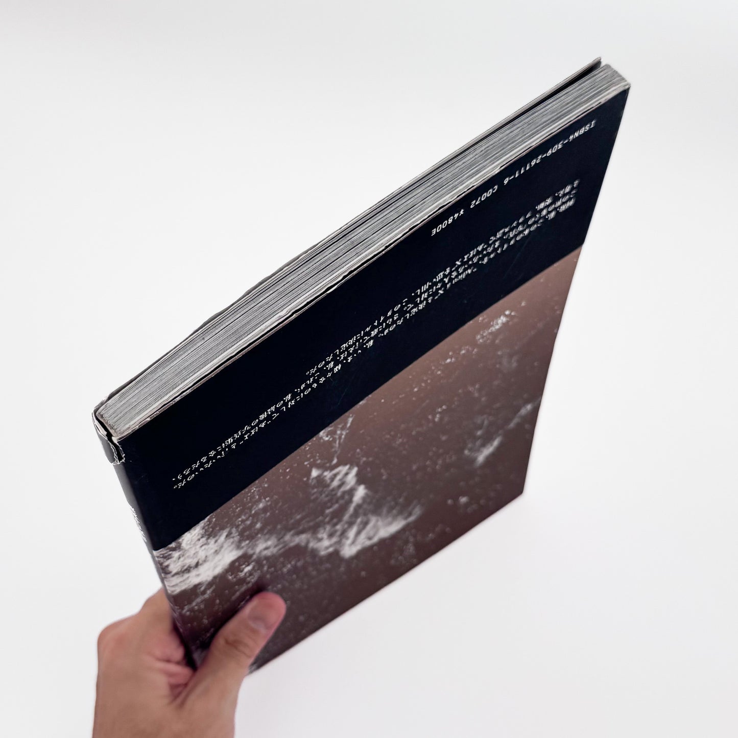 中平卓馬『ADIEU A X』。病後に再び続けた撮影によるモノクロ作品と自身のテキストを収録した、1989年河出書房新社刊の初版写真集。