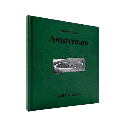 西野壮平『SHORT STORIES: Amsterdam』。2014年撮影の《Diorama Map》からアムステルダムの都市風景と細部を再構成した、2026年Migo刊の写真集。巻末にコラージュ作品全体図の折り込み付き。